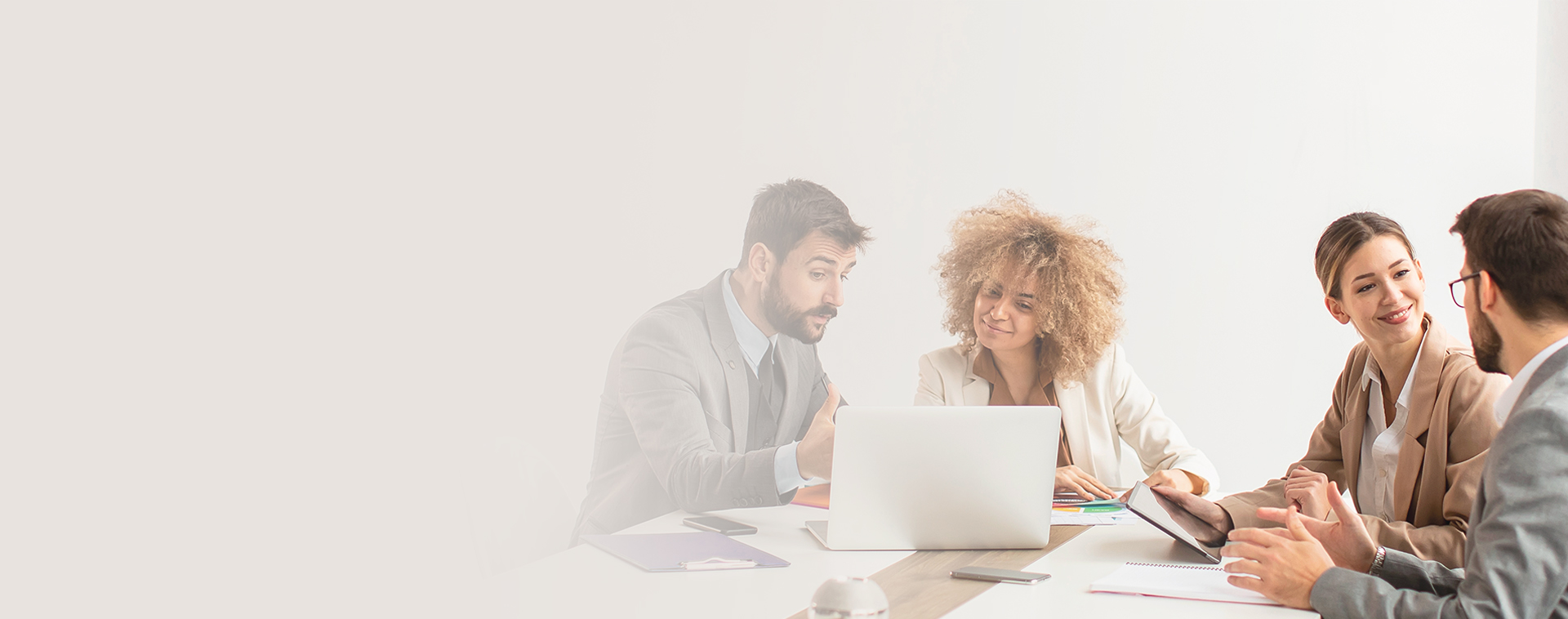 Image showing 4 people in a business meeting