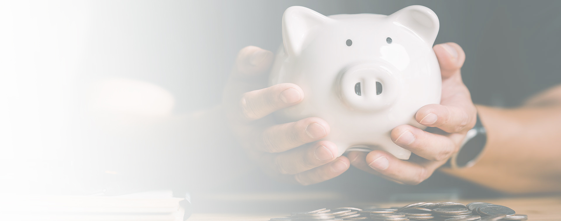 Image showing a man holding a piggy bank