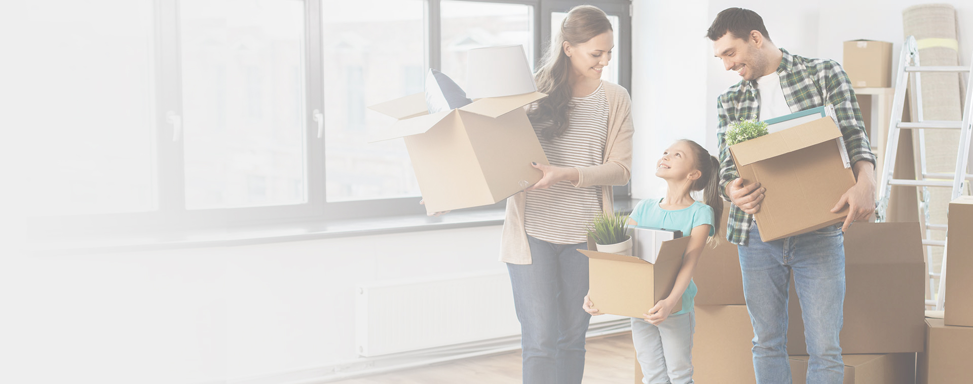 Image showing a family of 3 carrying boxes