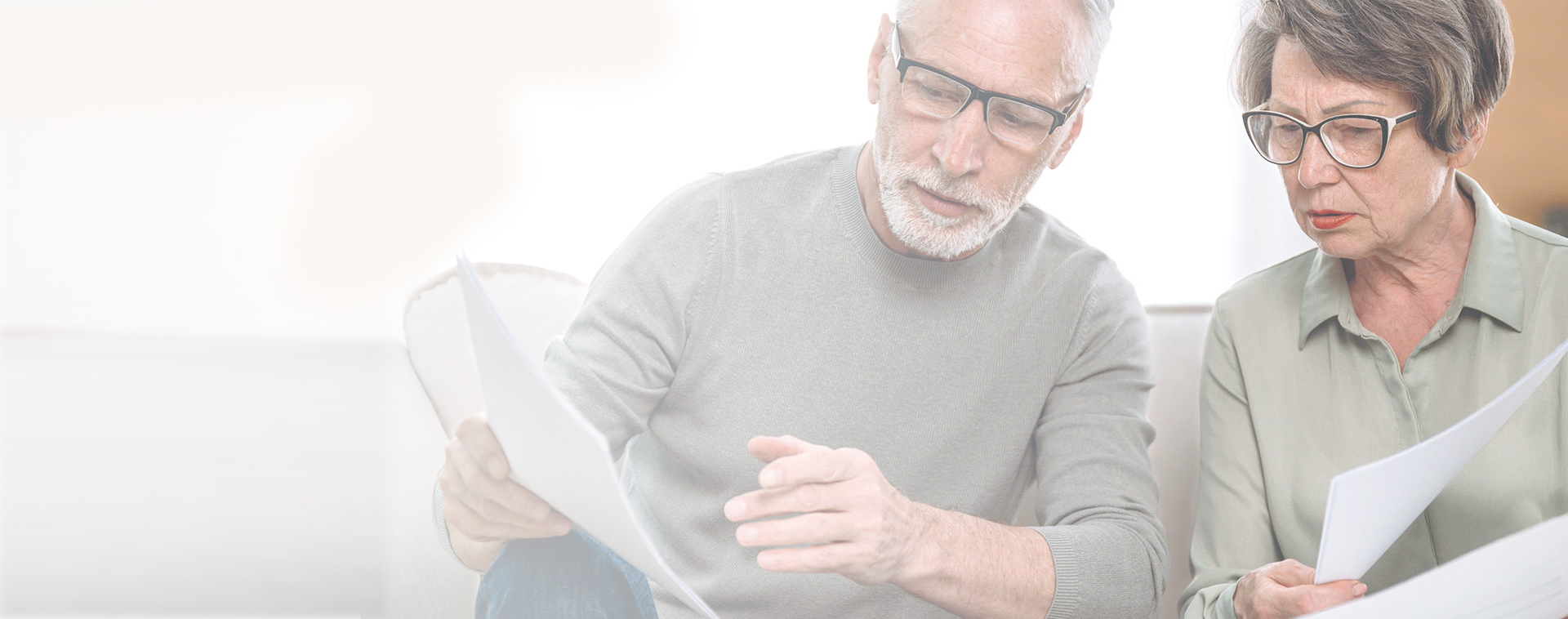 Image showing an older couple looking at paperwork together