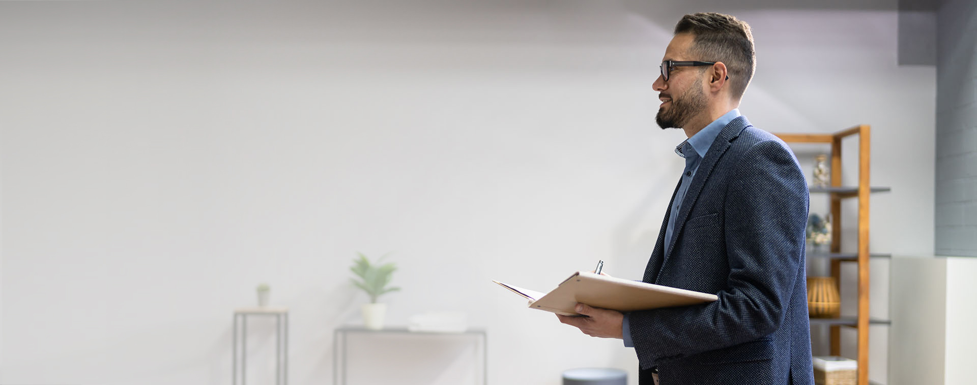 Image showing an appraiser inside a house holding a clipboard