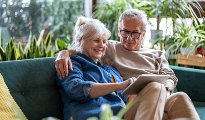 Image showing a happy old couple on the couch