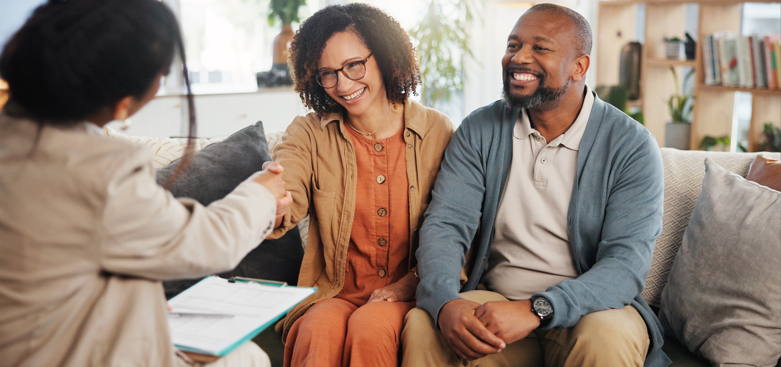 Image showing a happy couple talking with a women